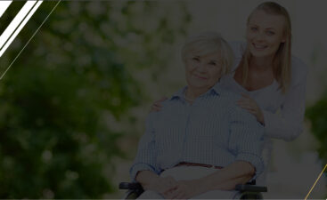 Smiling senior woman with caregiver outdoors.